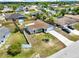Neighborhood street view showing the attractive landscaping and long driveway at 2375 Belen Dr, Deltona, FL 32738
