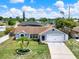 Inviting single-story home with manicured lawn and updated architectural details at 2375 Belen Dr, Deltona, FL 32738