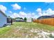 Wide backyard featuring a storage shed, fenced perimeter, and ample space for outdoor enjoyment at 2375 Belen Dr, Deltona, FL 32738