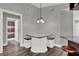 Cozy dining area features built-in seating and modern lighting, creating an inviting space for meals at 2375 Belen Dr, Deltona, FL 32738