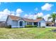 Inviting single-story home with manicured lawn and updated architectural details at 2375 Belen Dr, Deltona, FL 32738