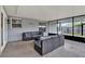 Inviting screened patio area with modern outdoor seating, ideal for enjoying outdoor living at 2375 Belen Dr, Deltona, FL 32738