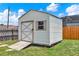 Sturdy backyard shed with ample storage space, featuring a convenient ramp for easy access at 2375 Belen Dr, Deltona, FL 32738