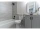 Bathroom featuring a sleek vanity with modern fixtures and a shower-tub combination at 2444 Omaha Dr, Deltona, FL 32738
