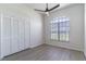 Bright bedroom with large window and spacious closet at 2444 Omaha Dr, Deltona, FL 32738