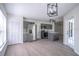 A stylish kitchen featuring gray cabinets, stainless steel appliances, and a functional island at 2444 Omaha Dr, Deltona, FL 32738