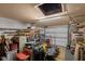 Spacious garage providing ample space for parking and storage with work bench at 25438 Pine Valley Dr, Sorrento, FL 32776