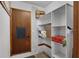 Pantry with shelves and door at 25438 Pine Valley Dr, Sorrento, FL 32776
