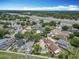Neighborhood aerial view featuring tree-lined streets and well-maintained homes and landscaping at 2641 Delcrest Dr, Orlando, FL 32817