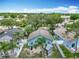 Aerial view of a home with a shed, patio, and fenced yard surrounded by lush landscaping at 2641 Delcrest Dr, Orlando, FL 32817
