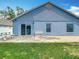 Backyard with a brick patio and sliding door at 2641 Delcrest Dr, Orlando, FL 32817