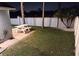 Spacious backyard featuring a picnic table, brick patio, manicured lawn, and privacy fence at 2641 Delcrest Dr, Orlando, FL 32817