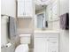 Well-lit bathroom features a vanity, mirror and a towel rack on the wall at 2641 Delcrest Dr, Orlando, FL 32817