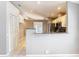 Bright kitchen with white cabinets, stainless steel appliances, and granite countertops at 2641 Delcrest Dr, Orlando, FL 32817