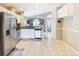 Spacious kitchen with stainless steel appliances, white cabinets, and granite countertops at 2641 Delcrest Dr, Orlando, FL 32817