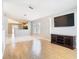 Inviting living room featuring tile and hardwood flooring, neutral walls, and abundant natural light at 2641 Delcrest Dr, Orlando, FL 32817