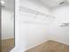 Empty walk-in closet with carpet and wire shelving at 2641 Delcrest Dr, Orlando, FL 32817