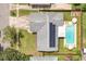 Aerial view of home featuring a pool, solar panels, and an outdoor seating area at 3024 Saratoga Dr, Orlando, FL 32806