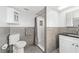 Modern bathroom with sleek gray and white finishes, plus a stylish shower at 3024 Saratoga Dr, Orlando, FL 32806