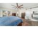 Comfortable main bedroom with private ensuite access and stylish decor at 3024 Saratoga Dr, Orlando, FL 32806