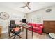 Functional home office with a comfortable seating area and space for remote work at 3024 Saratoga Dr, Orlando, FL 32806
