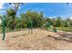 Community playground featuring a swing set, slide, and climbing structure, providing fun for children at 3303 Azolla St, Orlando, FL 32808