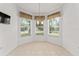 Cozy breakfast nook surrounded by windows at 3419 Fernwood Dr, Kissimmee, FL 34741