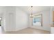 Dining area featuring neutral decor, tile floors and ample natural light at 3419 Fernwood Dr, Kissimmee, FL 34741