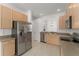 Updated kitchen with stainless steel appliances at 3419 Fernwood Dr, Kissimmee, FL 34741