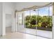 Relaxing screened lanai with tranquil views of the landscaped backyard at 3419 Fernwood Dr, Kissimmee, FL 34741