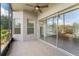 Large screened in porch leads to water view in backyard at 3419 Fernwood Dr, Kissimmee, FL 34741