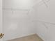 Spacious walk-in closet with wire shelving for optimal storage at 3419 Fernwood Dr, Kissimmee, FL 34741