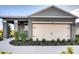 Charming single-Gathering home with a two-car garage and manicured landscaping at 3665 Fort Mellon Ln, Sanford, FL 32773