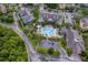 Aerial view of condo complex with community pool, parking and professional landscaping at 3707 Conroy Rd # 1715, Orlando, FL 32839