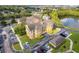 Aerial view of apartment complex, manicured landscape, surface parking and community amenities at 3707 Conroy Rd # 1715, Orlando, FL 32839