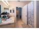Bright bathroom with double sinks, ample counter space, and tub shower with decorative curtain at 3707 Conroy Rd # 1715, Orlando, FL 32839