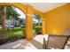 Outdoor covered patio with seating, great view of the community landscape and green space at 3707 Conroy Rd # 1715, Orlando, FL 32839