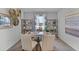 Stylish home office with modern desk setup, decorative shelving and neutral tones at 3711 Bluethread Way, Poinciana, FL 34759