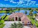 Beautiful aerial view of the home showing the lush greenery, lake views, and well maintained landscaping at 3728 Hunters Isle Dr, Orlando, FL 32837