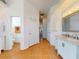 Spacious bathroom features a marble-top vanity, linen closet and access to a private toilet room at 3728 Hunters Isle Dr, Orlando, FL 32837