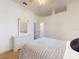 Bedroom featuring a bed, dresser, and ensuite bathroom, providing convenience and privacy at 3728 Hunters Isle Dr, Orlando, FL 32837