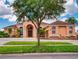 Traditional home exterior featuring mature trees, well-maintained lawn, and inviting curb appeal at 3728 Hunters Isle Dr, Orlando, FL 32837