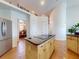 Spacious kitchen island with cooktop, stainless steel appliances, and ample storage at 3728 Hunters Isle Dr, Orlando, FL 32837