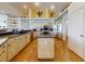 Well-equipped kitchen with a central island, stainless steel appliances, and ample cabinet space at 3728 Hunters Isle Dr, Orlando, FL 32837
