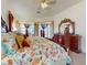 Comfortable main bedroom with carpeted floor and a warm color palette at 3728 Hunters Isle Dr, Orlando, FL 32837