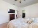 Well-lit main bedroom with ensuite bathroom and closet, offers privacy and functionality at 3728 Hunters Isle Dr, Orlando, FL 32837