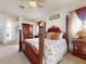 Comfortable main bedroom with carpeted floor and a warm color palette at 3728 Hunters Isle Dr, Orlando, FL 32837
