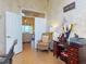 Dedicated office space is complete with tiled floor, ceiling fan, and natural light at 3728 Hunters Isle Dr, Orlando, FL 32837