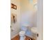 Compact powder room featuring a unique sink and neutral tile, offering functionality in a small space at 3728 Hunters Isle Dr, Orlando, FL 32837