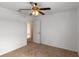 Neutral bedroom has fan and easy access to connecting rooms at 404 Bar Ct, Kissimmee, FL 34759